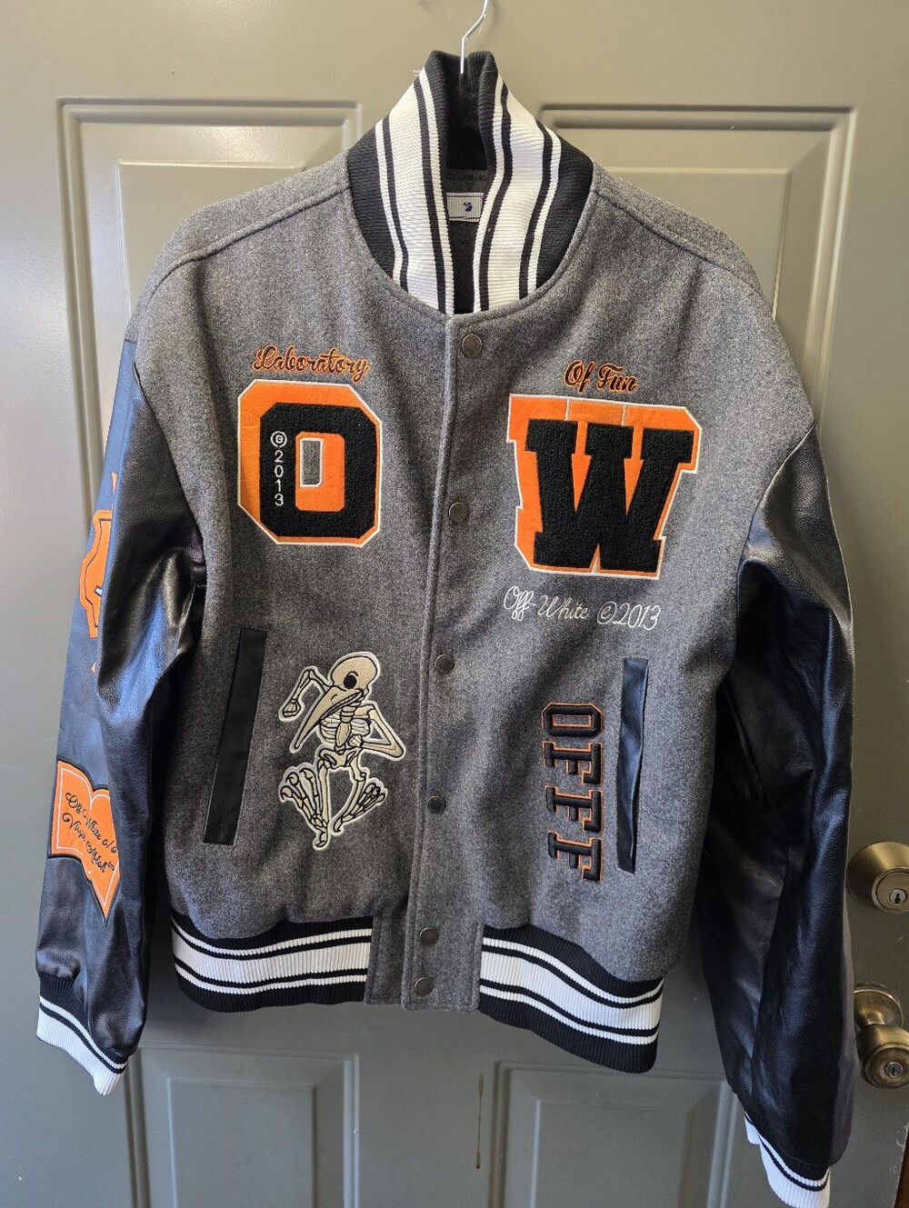 Gray & Black Varsity Jacket with Orange Patches